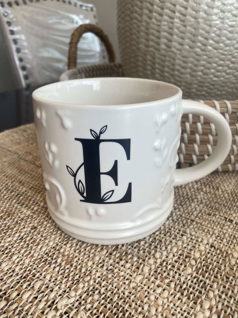 White Ceramic Mug with Stylized 'E' Monogram
